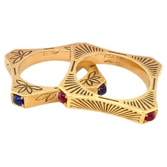 Rare paire de bagues en or, rubis et saphir de Cartier