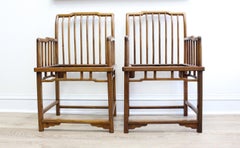 A Rare Pair of Huanghuali Armchairs