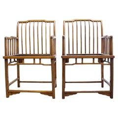 A Rare Pair of Huanghuali Armchairs 