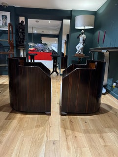 A rare pair of Italian Macassar Ebony armchairs