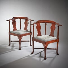 A rare pair of large-scale 18th century George II architectural corner chairs
