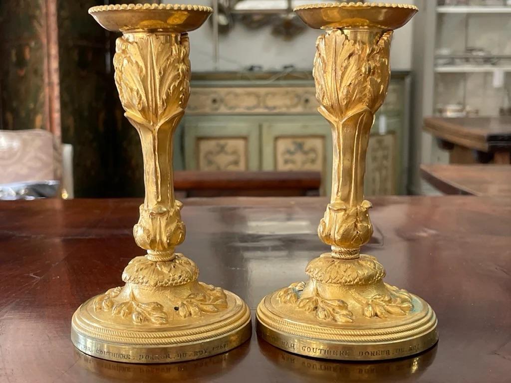 French A rare pair of Louis XV gilt bronze candlesticks signed P. Gouthiere For Sale