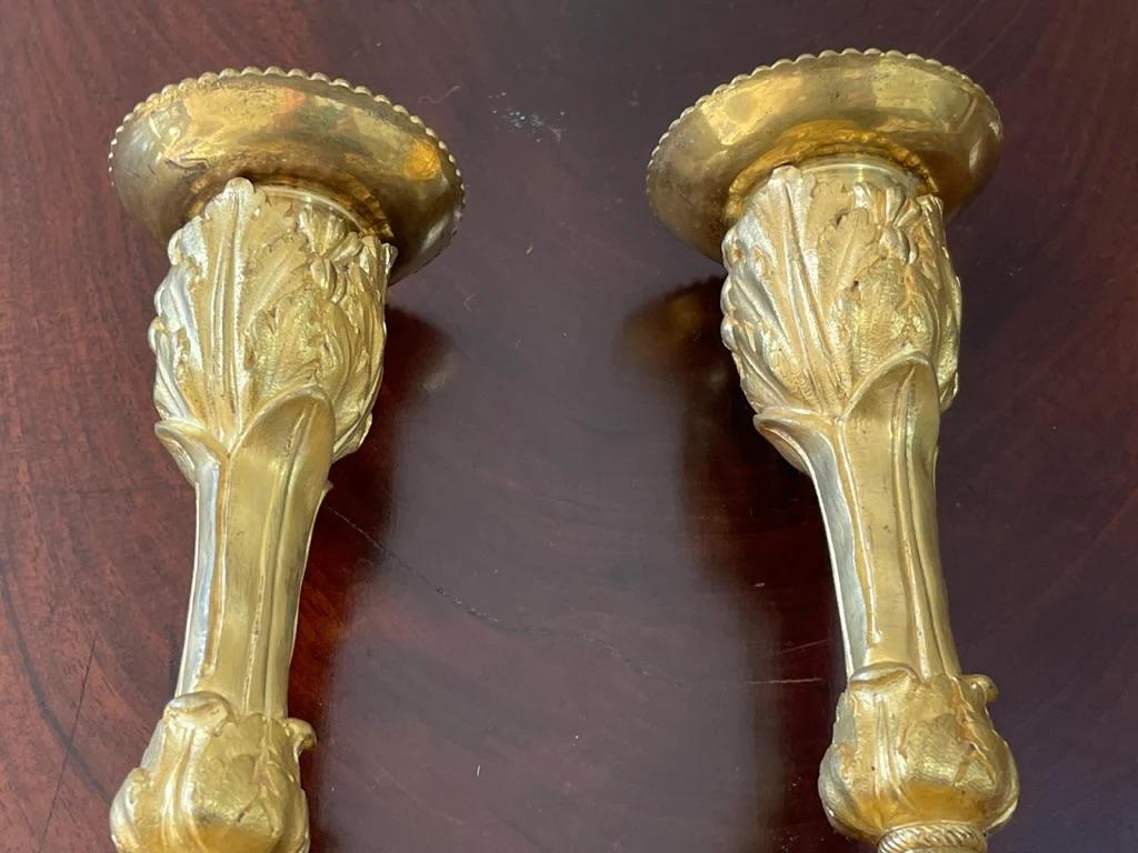 18th Century and Earlier A rare pair of Louis XV gilt bronze candlesticks signed P. Gouthiere For Sale