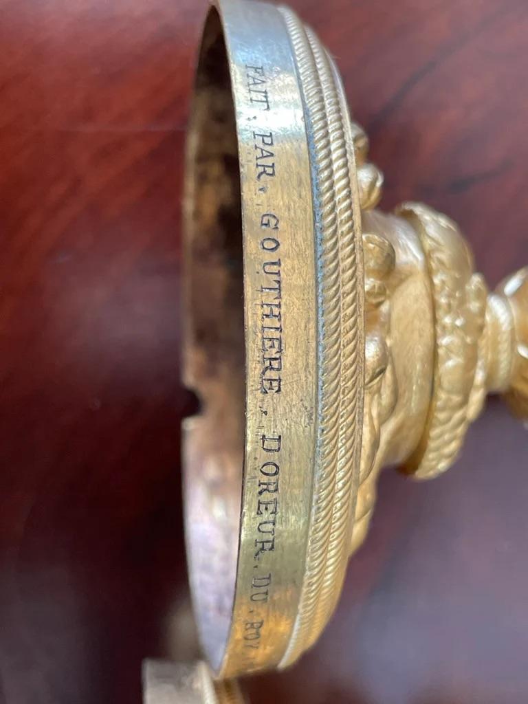 A rare pair of Louis XV gilt bronze candlesticks signed P. Gouthiere For Sale 1