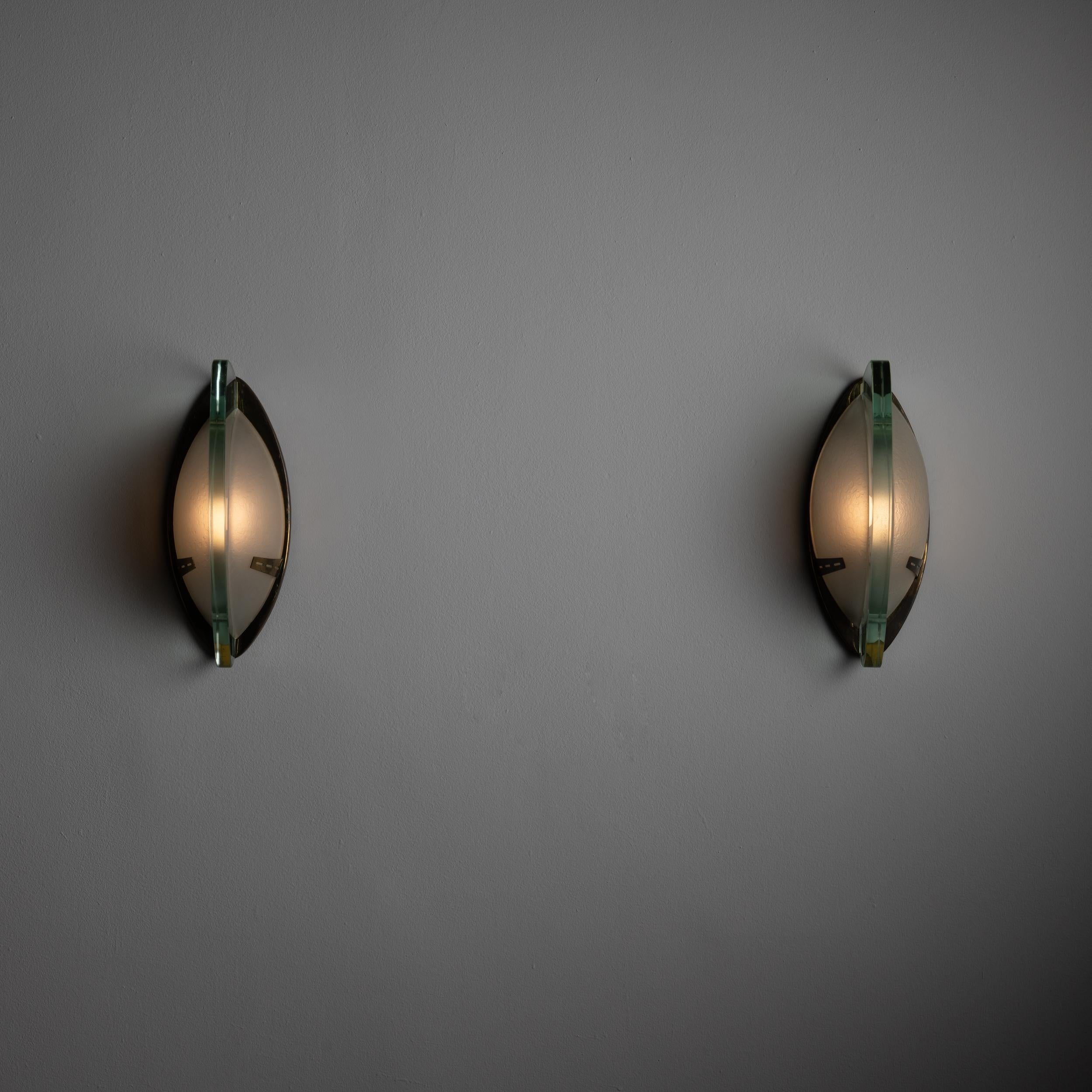 Patinated Rare Pair of Sconces by Stilnovo, Model 2122