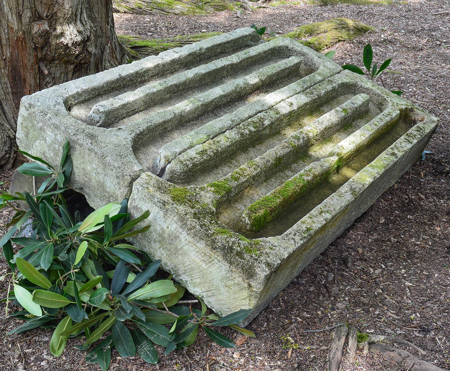 A rare carved limestone spirit cooler with serpentine channels, in two parts.

Used in the Cognac region of France as part of the distillery production of the famous brandy that bears its name.
 