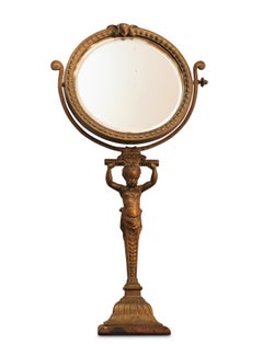 A Rare Regency Cherubic Brass Revolving Vanity Mirror