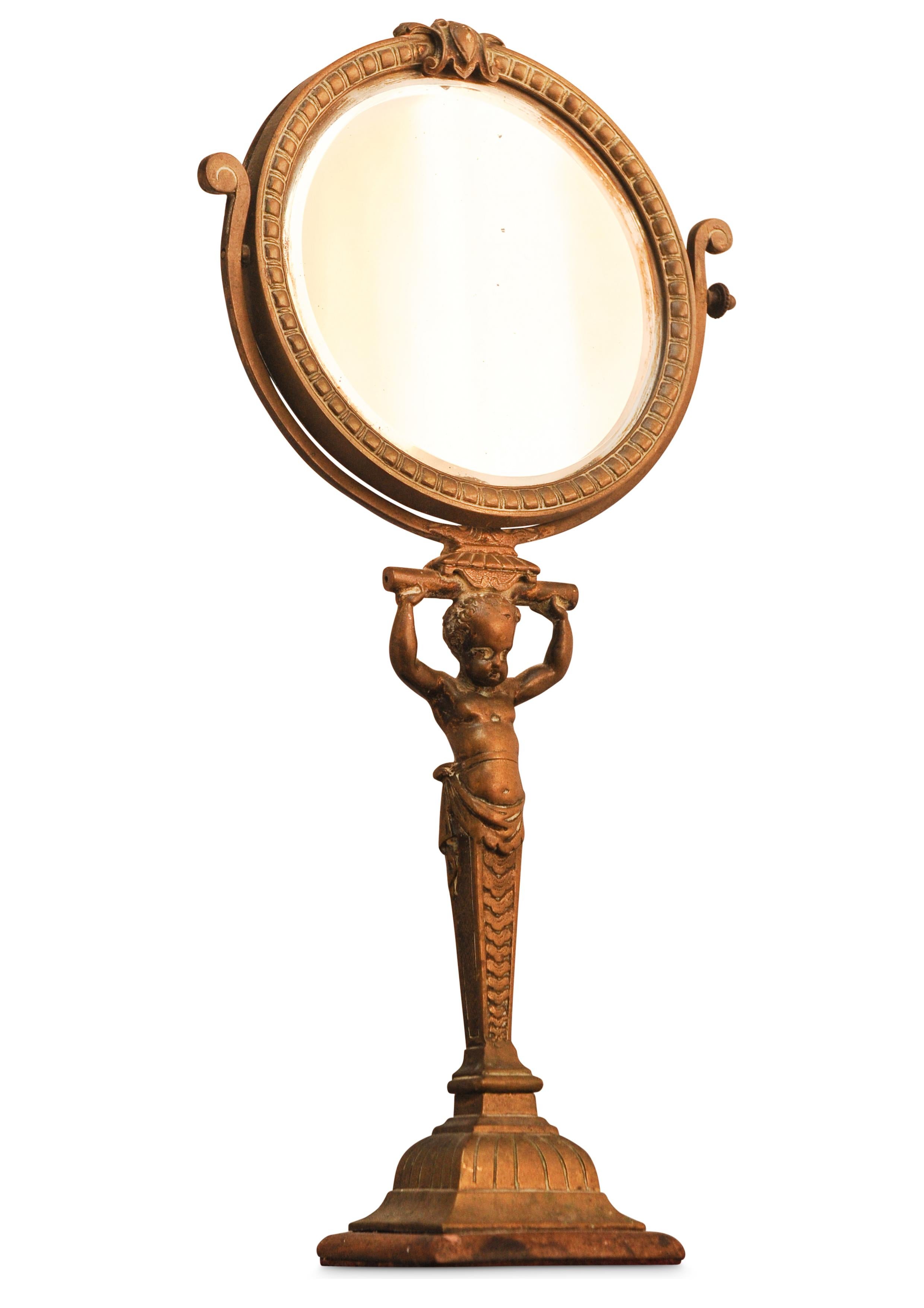 British A Rare Regency Cherubic Brass Revolving Vanity Mirror  For Sale