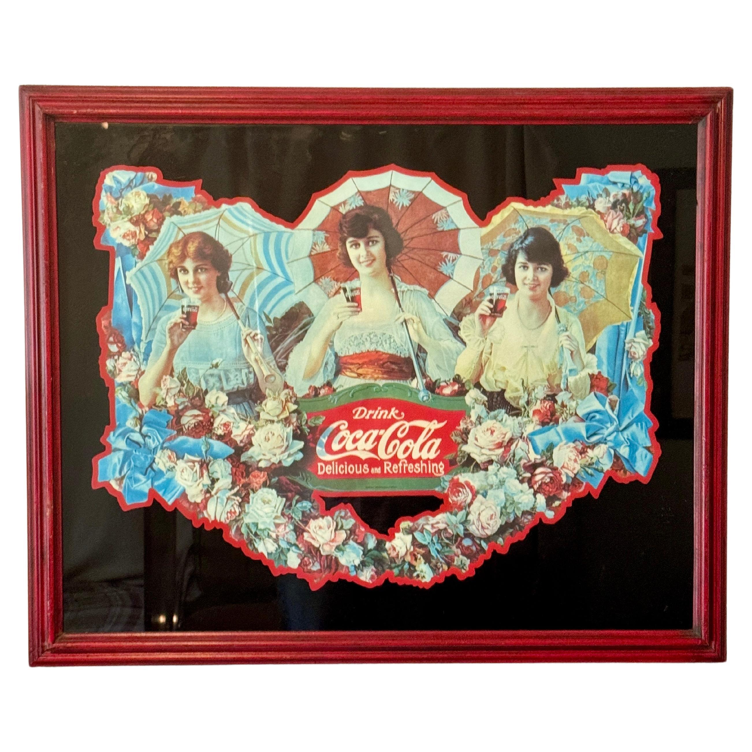 Una rara reproducción de las paragüeras de Coca Cola en un marco rústico rojo