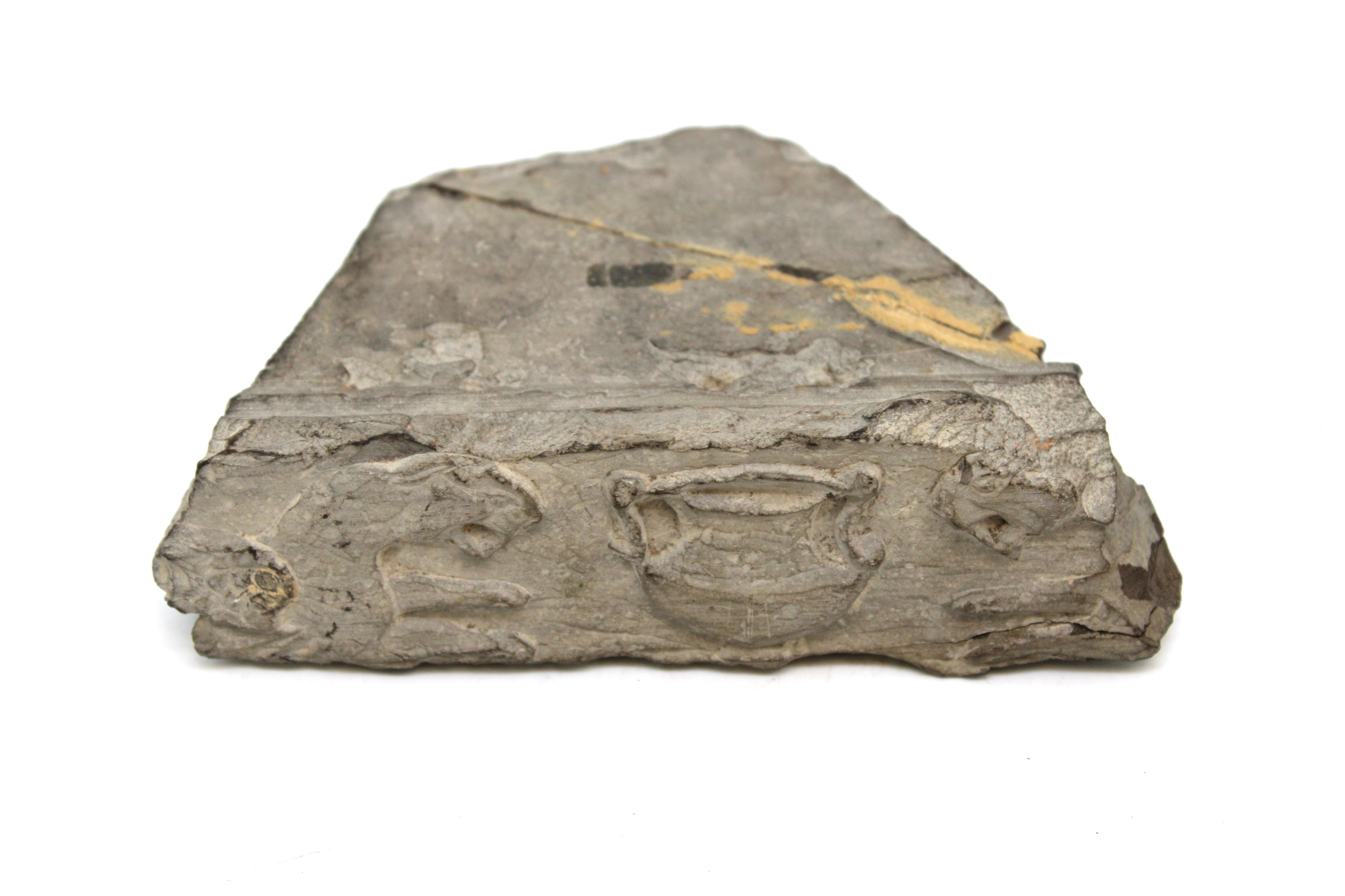 A Rare Second Temple Period Limestone Table Fragment – Featuring Lions of Judah – Jerusalem, Circa 1st Century BCE – 1st Century CE

A remarkably evocative artifact from the very heart of ancient Jewish history, this limestone table fragment dates