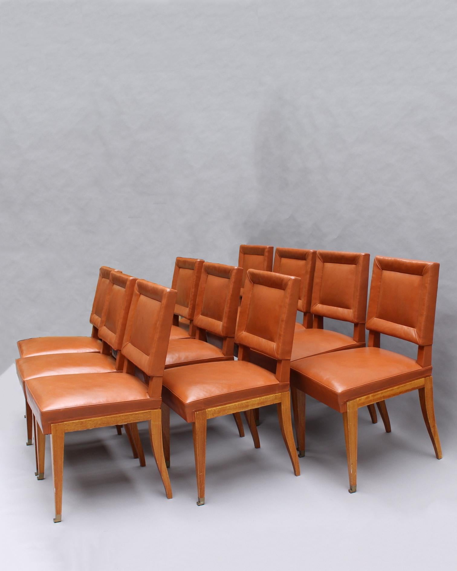 French Rare Set of 10 Leather and Mahogany Chairs by Jacques Quinet