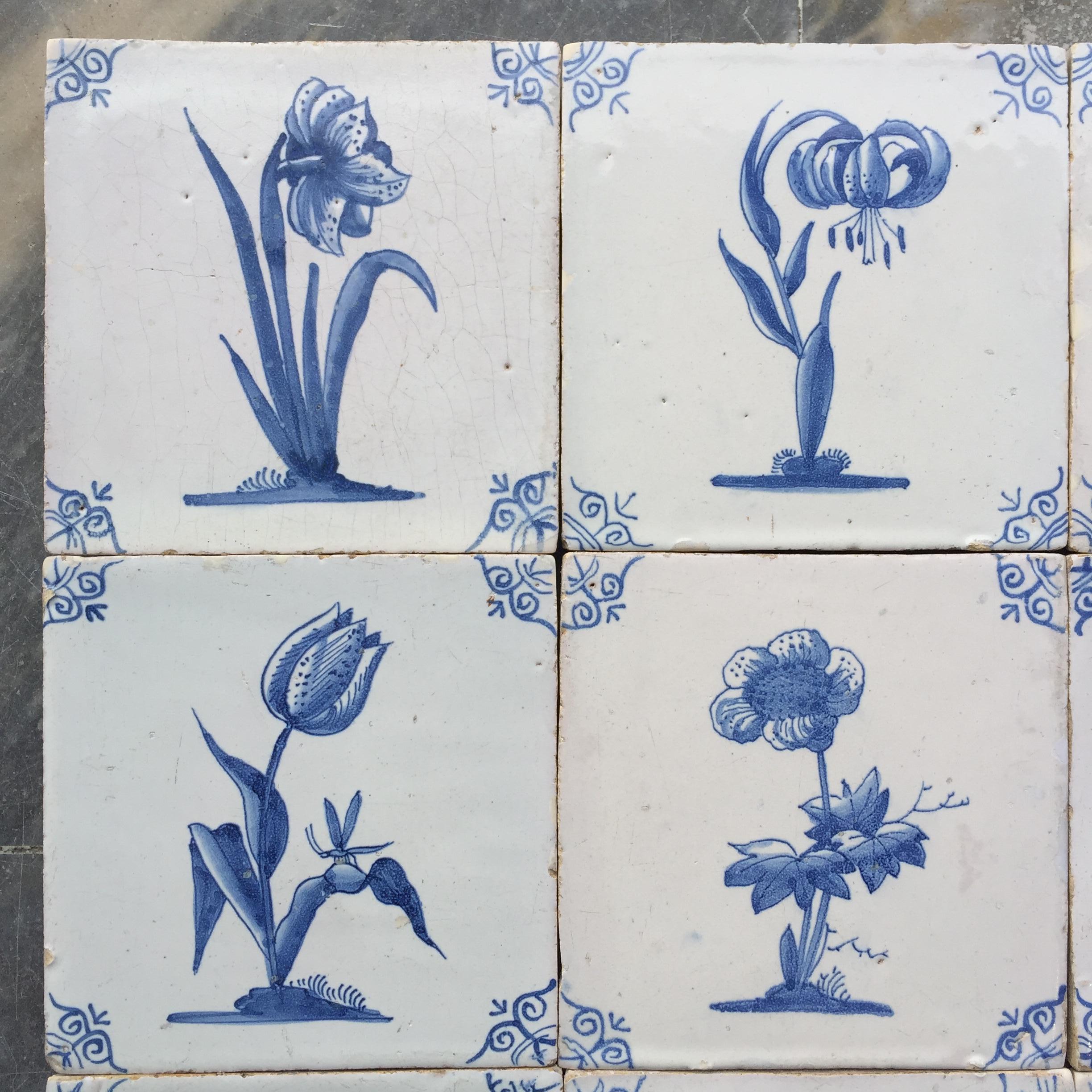 A rare set of 12 blue and white Dutch Delft tiles with flowers and insects.
Made in Amsterdam, The Netherlands.
Circa 1680.

This set of tiles is of very fine quality and has a superb glaze, characteristic for the Amsterdam tile production of