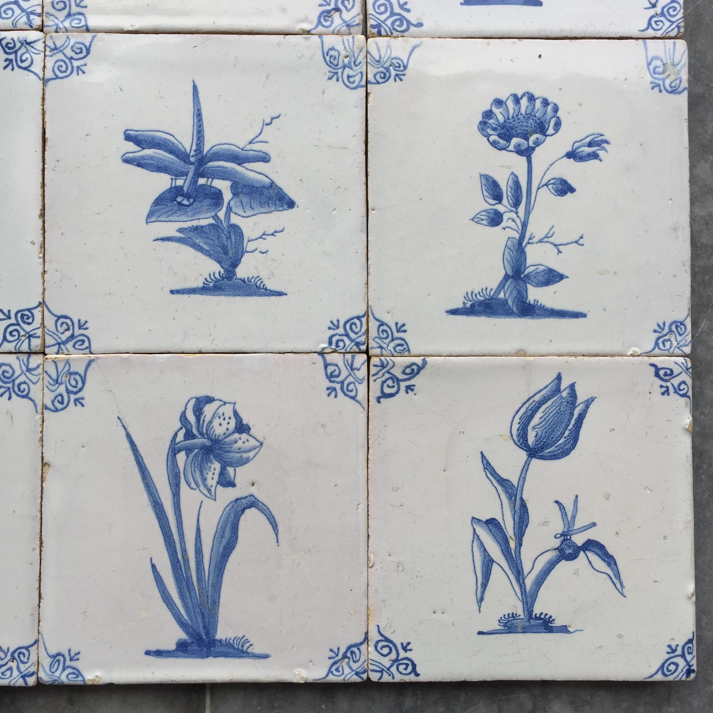 Rare Set of 12 Dutch Delft Tiles with Flowers and Insects, 17th Century In Good Condition In AMSTERDAM, NH