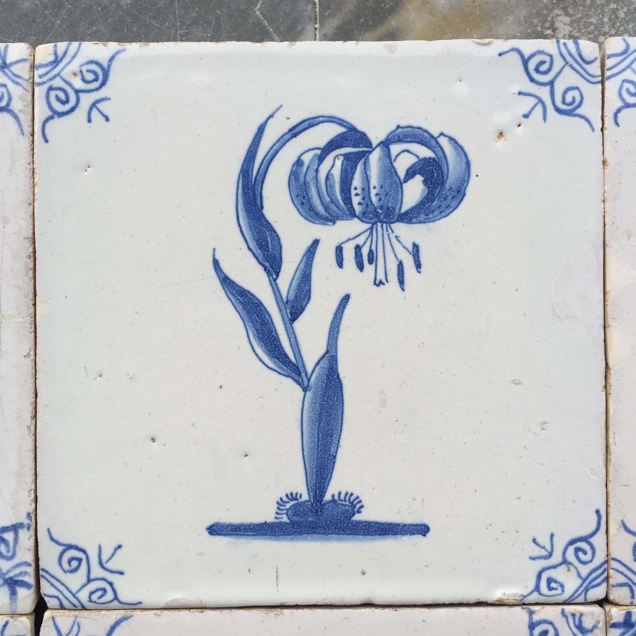 Rare Set of 12 Dutch Delft Tiles with Flowers and Insects, 17th Century 1