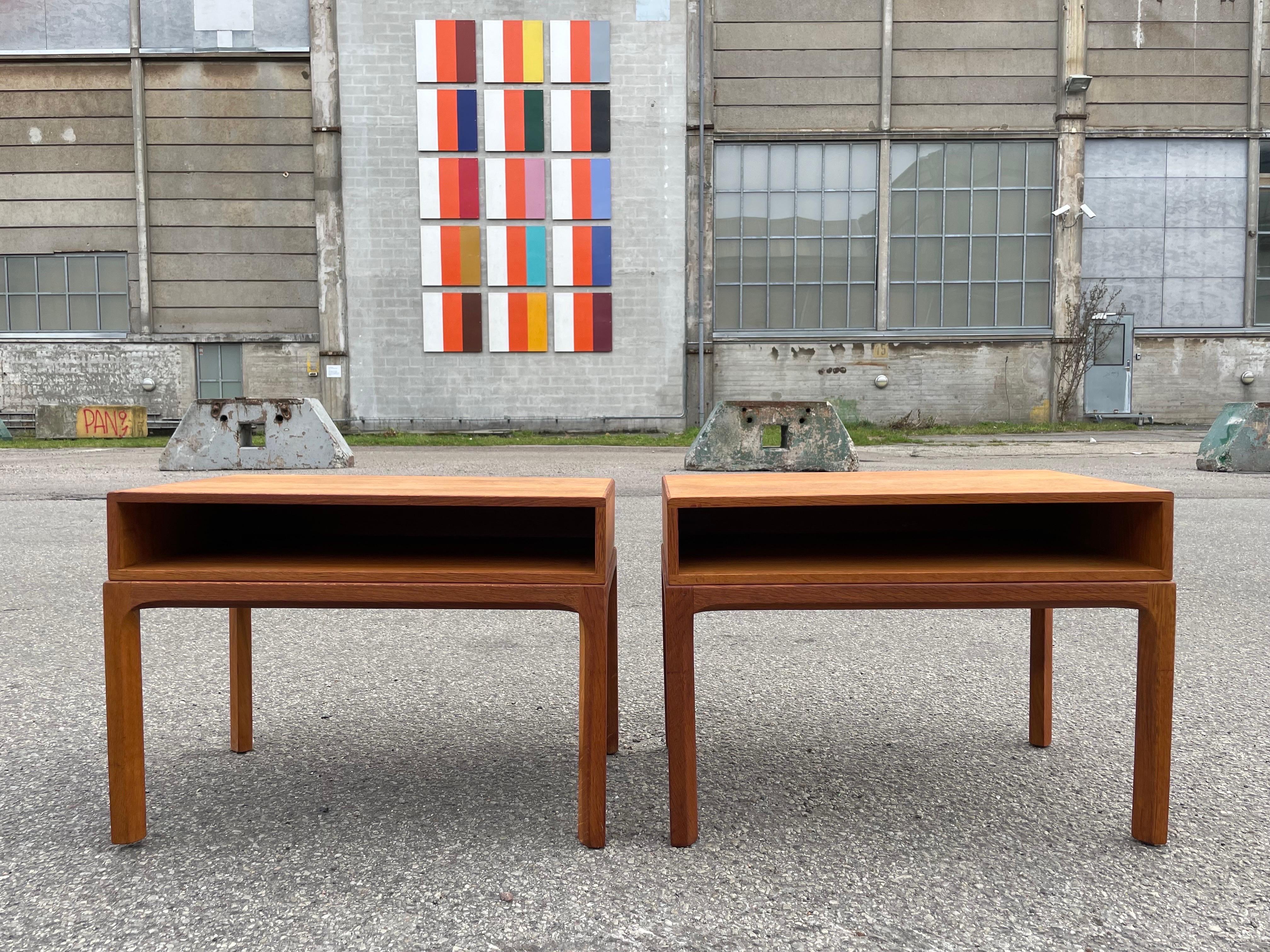 A stunning pair of vintage night stands designed by the legendary Kai Kristiansen and expertly crafted by Aksel Kjersgaard for Odder in the 1960s. These timeless pieces are a testament to mid-century Scandinavian design and are as relevant today as
