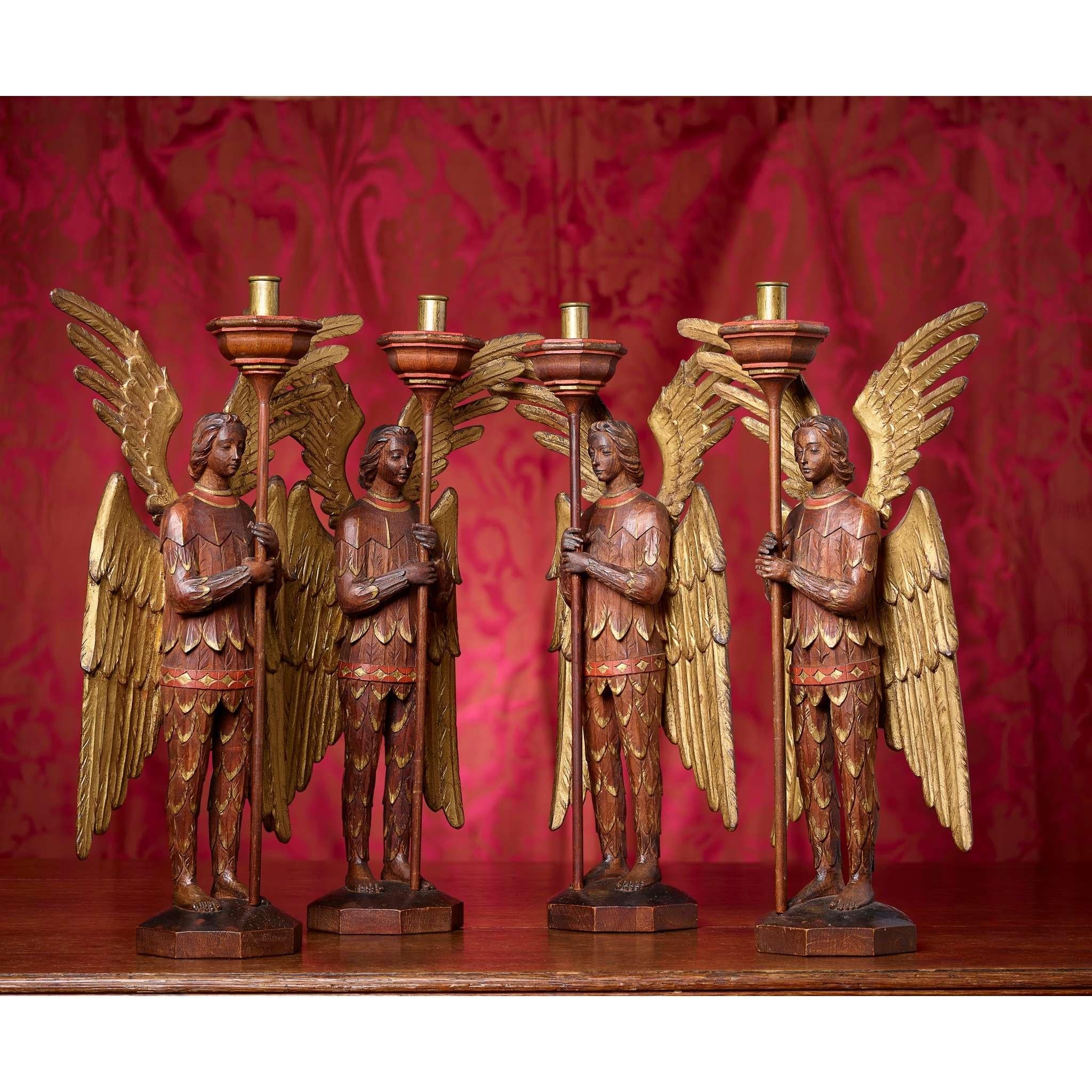 Arts and Crafts Rare ensemble de quatre bougeoirs 