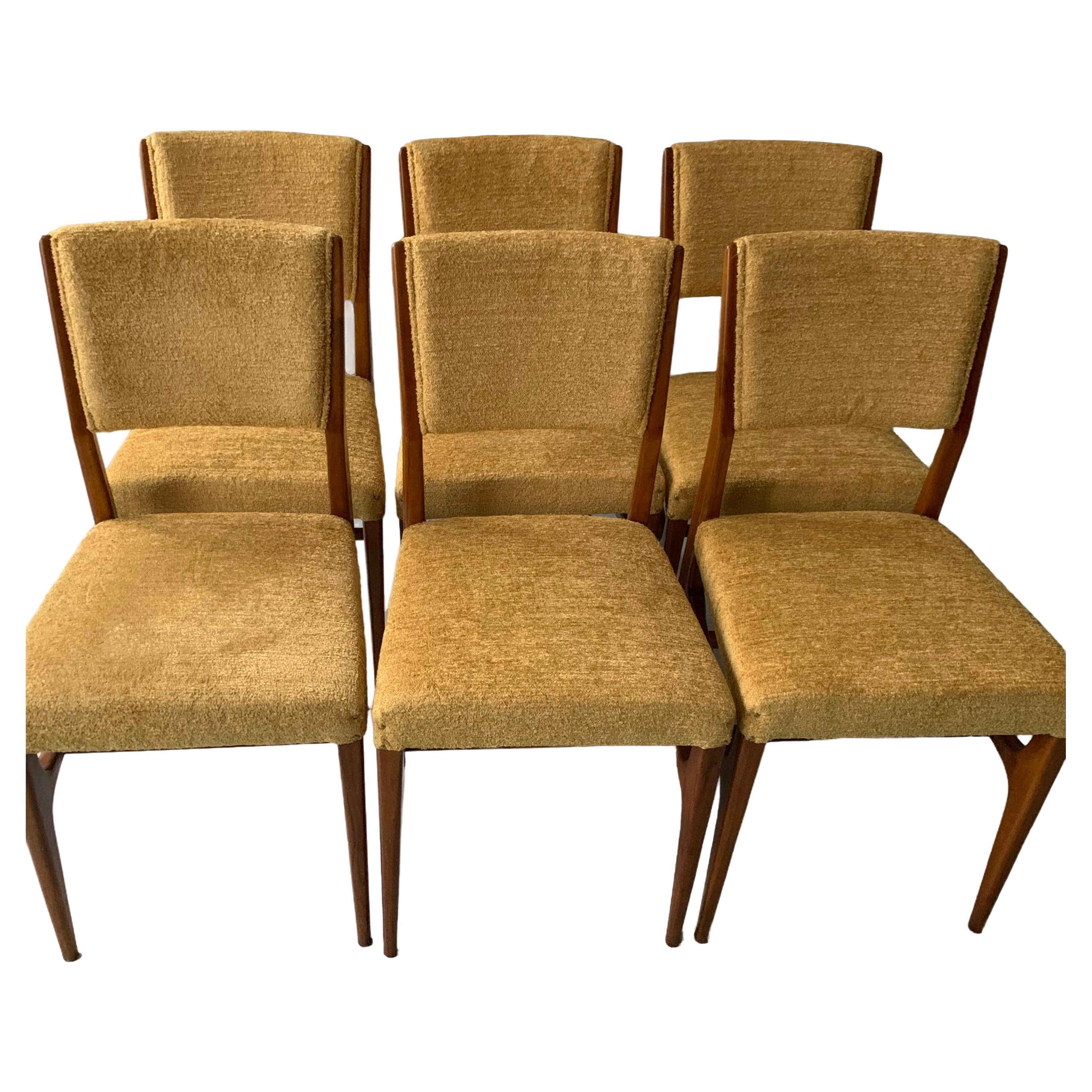 A rare set of Gio Ponti dining chairs.