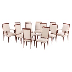 A rare set of sixteen French mahogany and giltwood dining chairs C 1940.