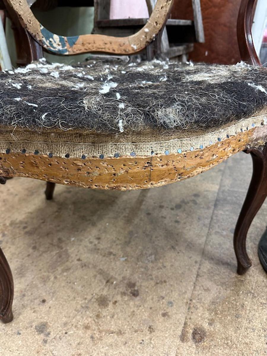 A rare set of twelve George III mahogany open arm chairs in the French Hepplewhi For Sale 8