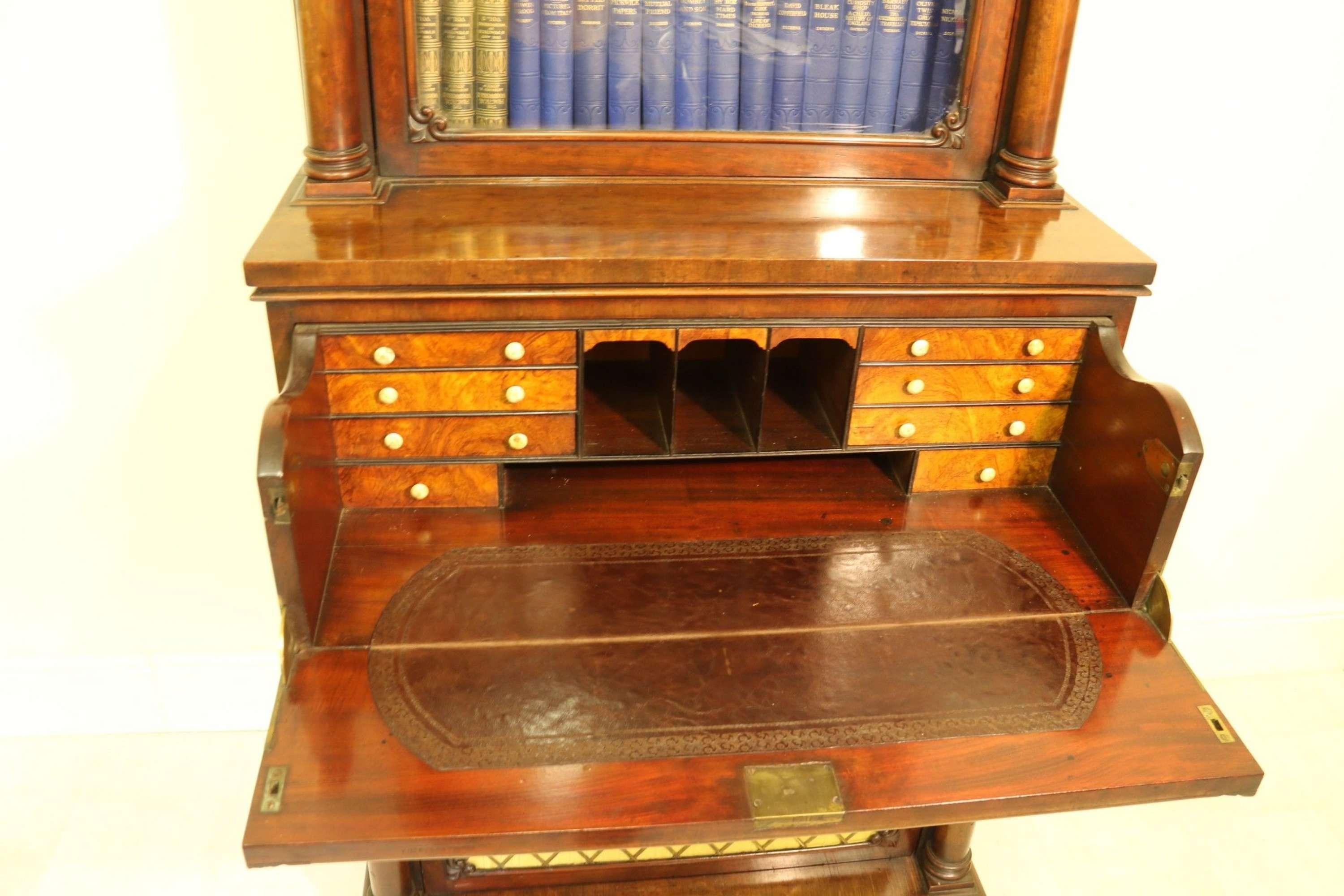 A Rare Small Regency Mahogany Secretaire Bookcase by Gillows of Lancaster

This very rare small sized figured mahogany secretaire bookcase has been beautifully made in the Regency workshops of Gillows, Lancaster, England. It is stamped Gillows