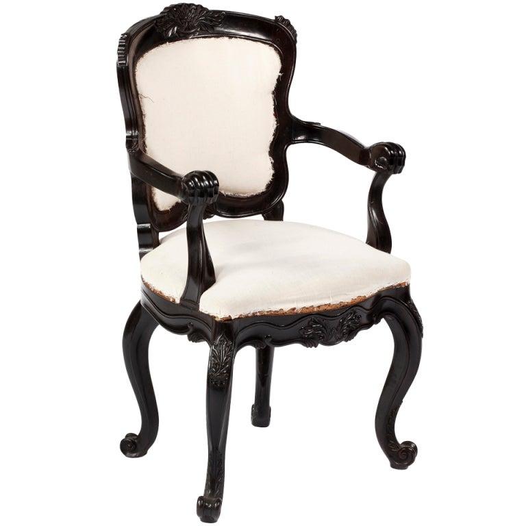 A Rare  Solid Ebony Rococo Armchair, Colonial Portuguese For Sale