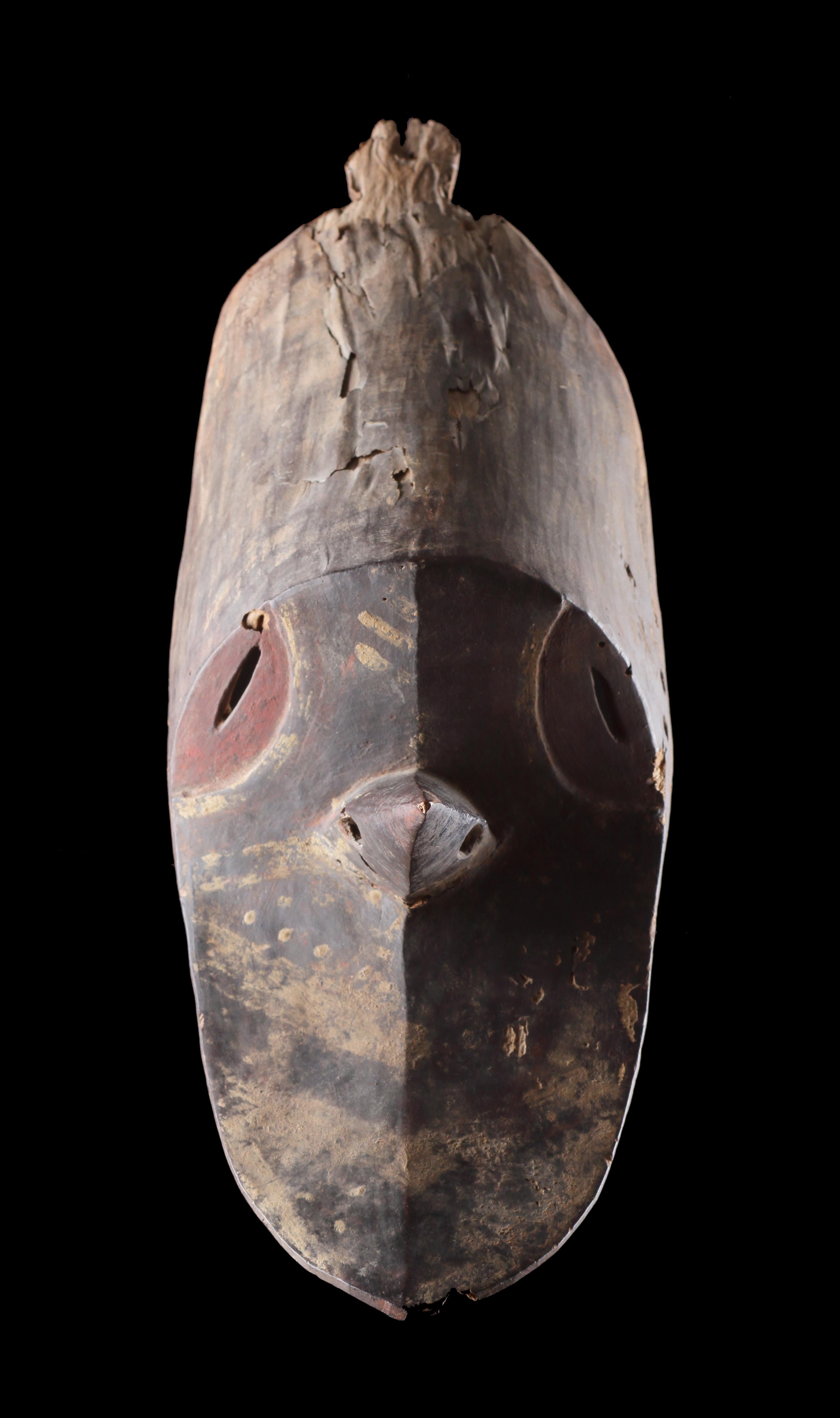A Rare Spirit Mask ‘Barak’ or ‘Yamburai Parak’
Wood, remains of polychrome
Eastern Sepik Province, New Guinea
Late 19th - early 20th Century

SIZE: 45cm high, 35cm deep - 17¾ ins high, 13¾ ins deep

Originally these masks were brightly coloured.