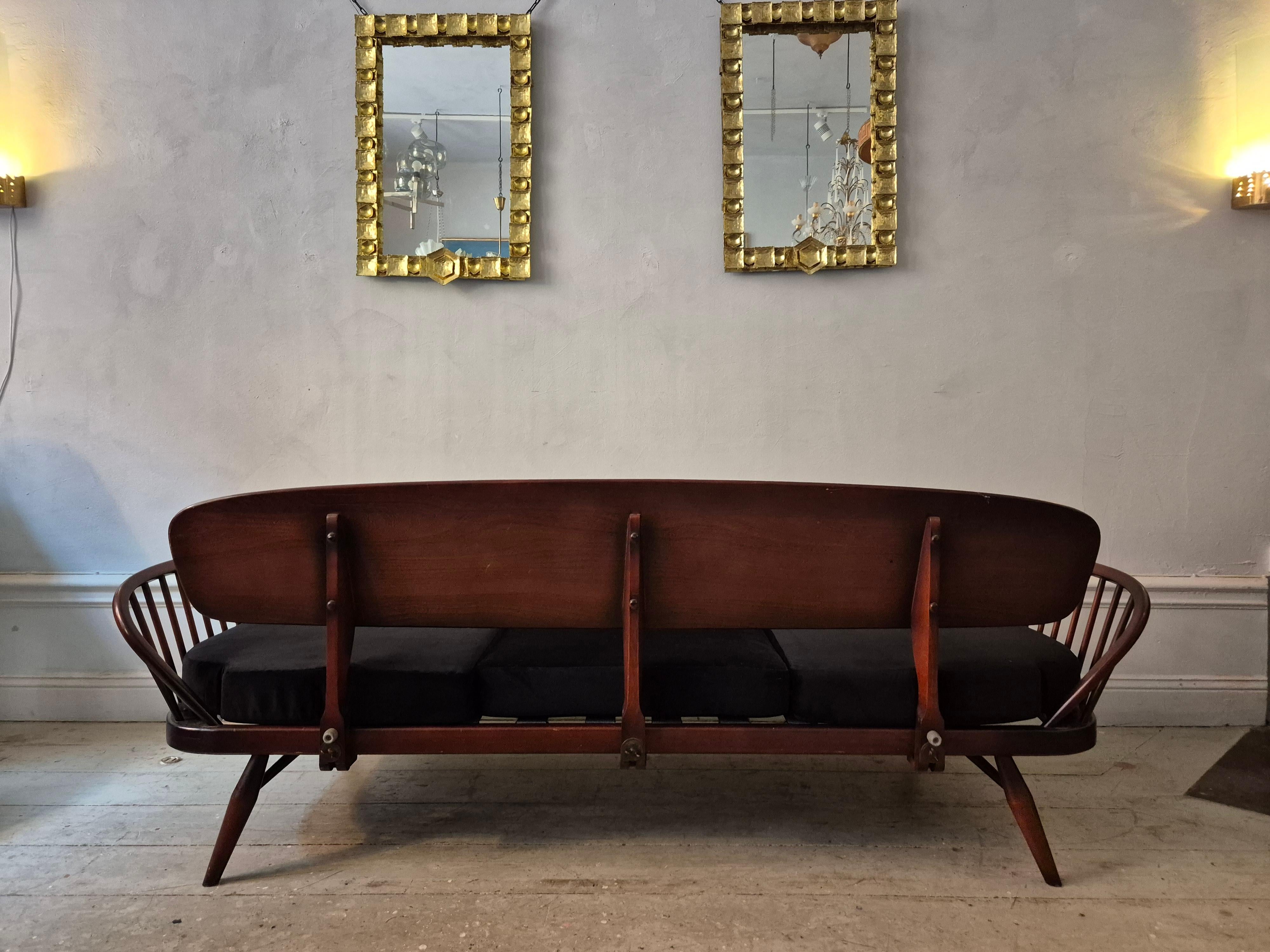 A rare stylish sofa by, Midcentury Modern. Re-upholstered in black velvet. For Sale 1