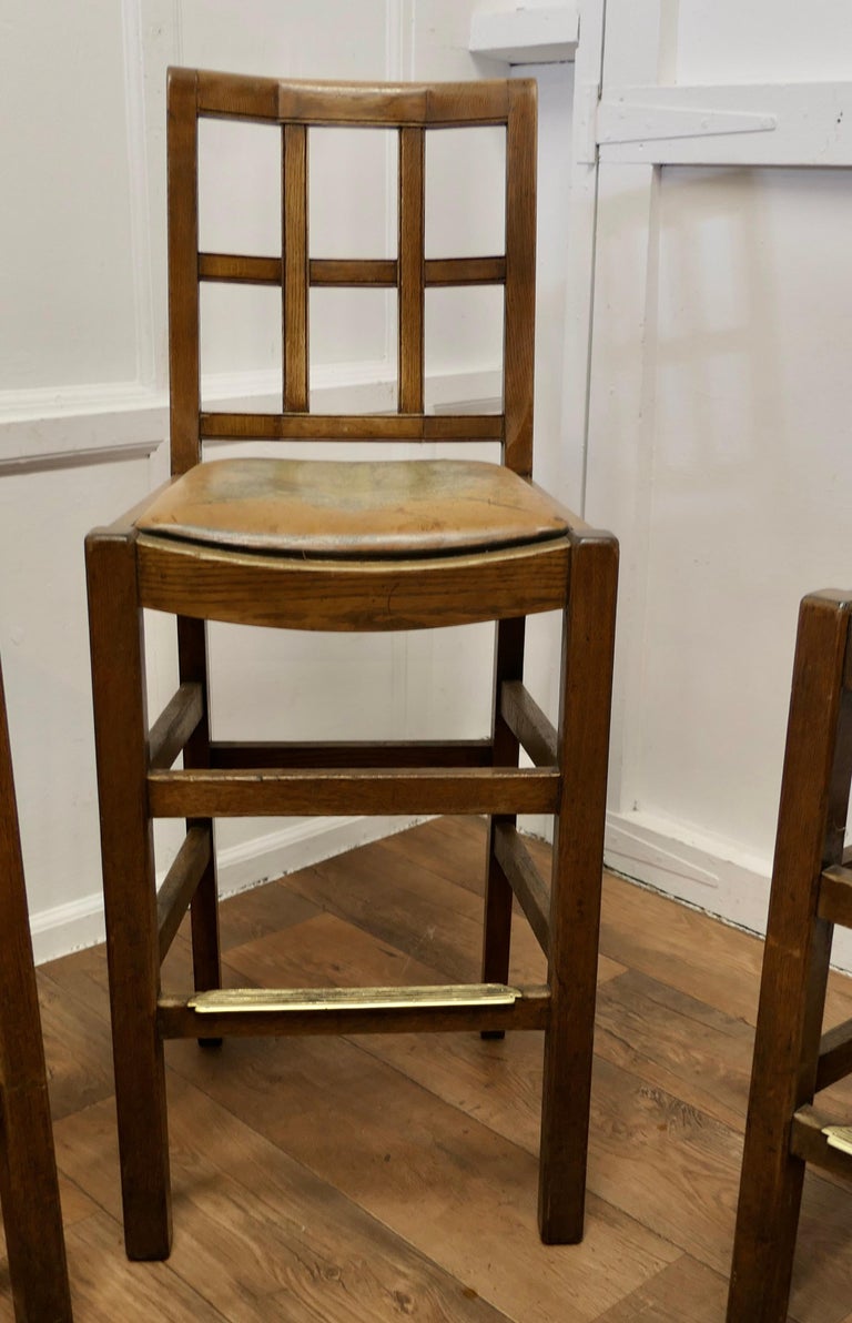 A Rare Trio of Arts and Crafts High Bar Stools, in Golden Oak For
