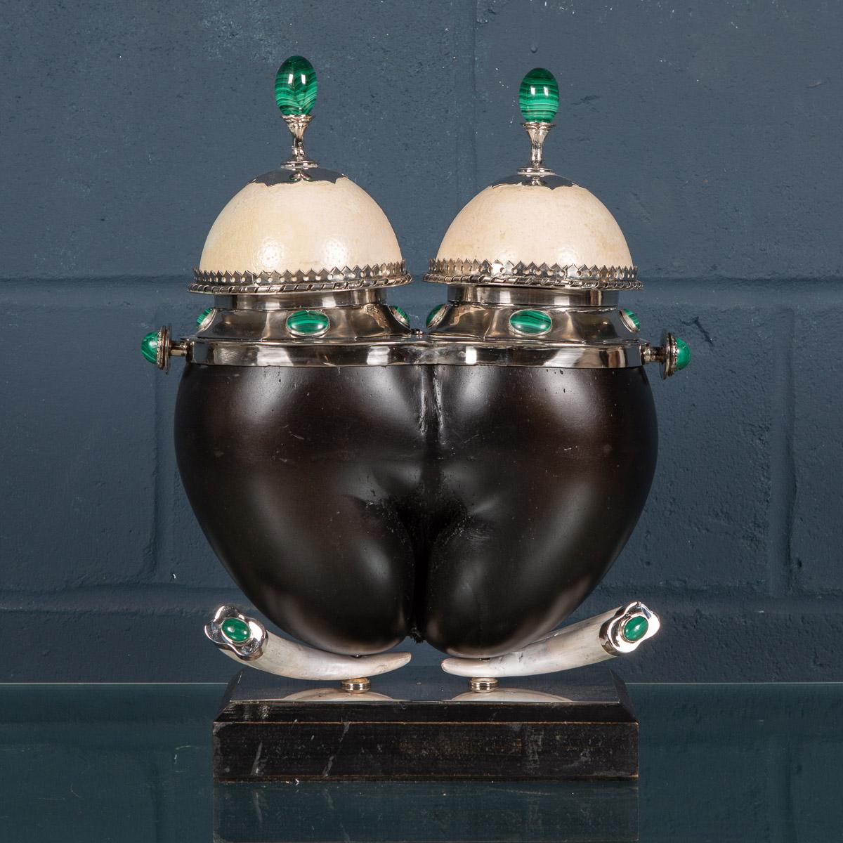 Signed Anthony Redmile, this extremely rare & unusual 1970's Coco de Mer Seychelles double coconut box is one of the most unusual and finest examples of the great artist’s work. Silvered mounts, ostrich egg lids, embellished with malachite,