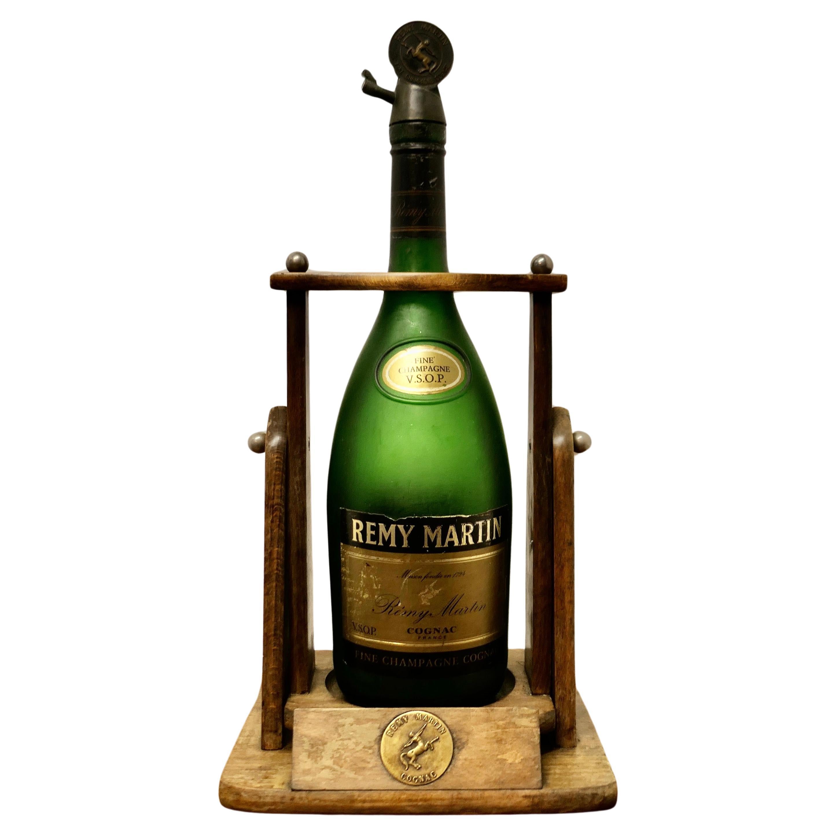 A Rare Vintage Remy Martin 3 Litre Bottle with Original Cradle Pouring Stand   For Sale