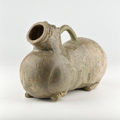 A Rare Yue Celadon-Glazed Figural Vessel, Western Jin dynasty (265-420)