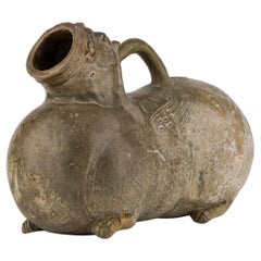 A Rare Yue Celadon-Glazed Figural Vessel, Western Jin dynasty (265-420)