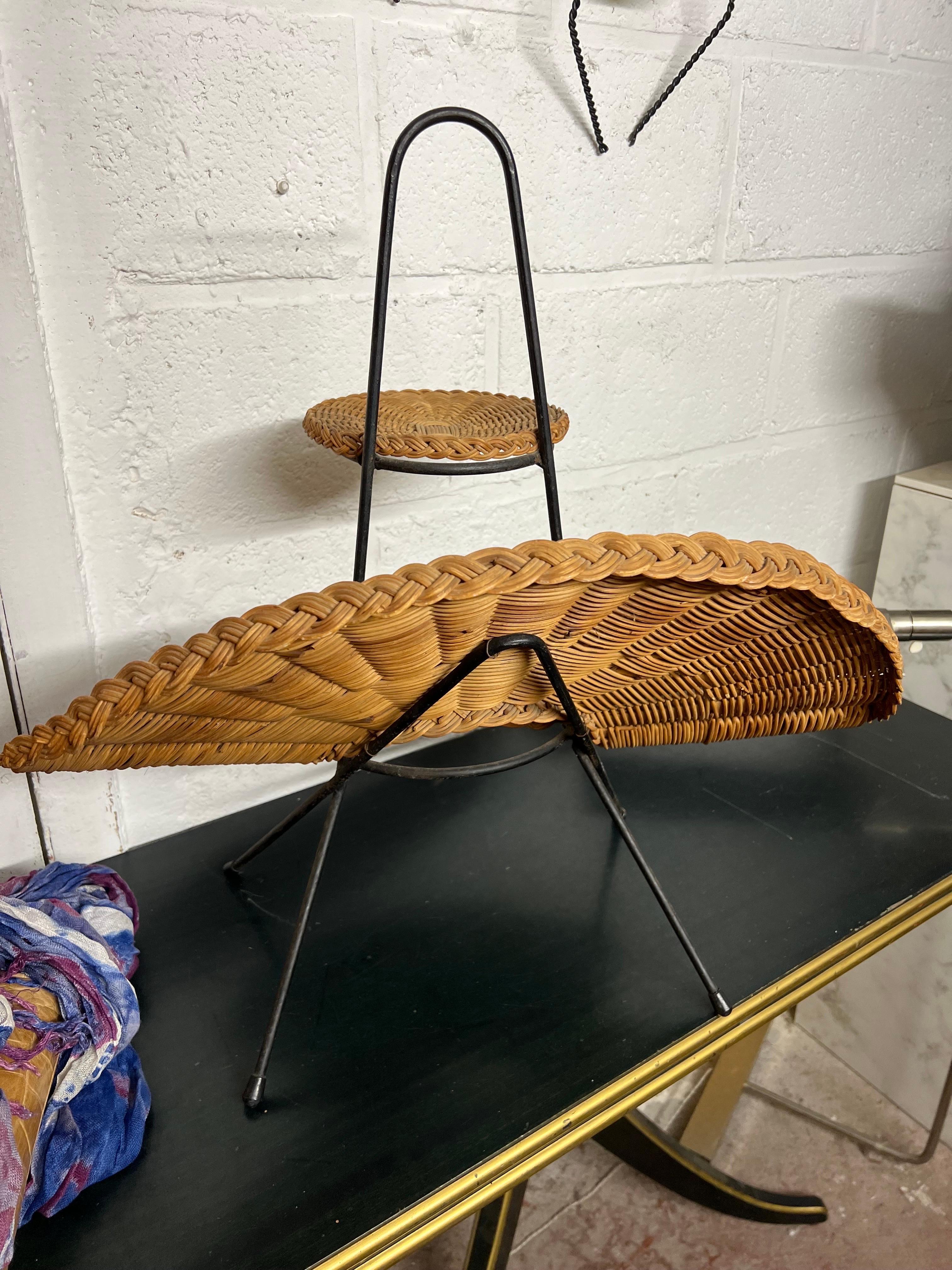 an unusual papers stand in rattan