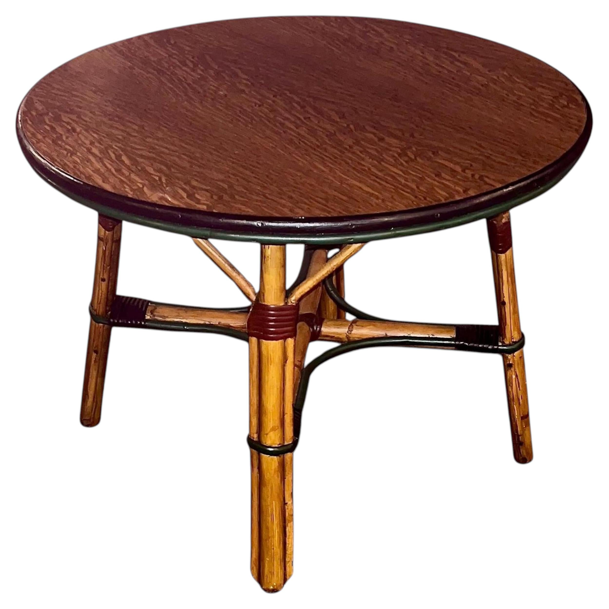A rattan coffee table in natural finish / colored trim and quarter sawn oak top