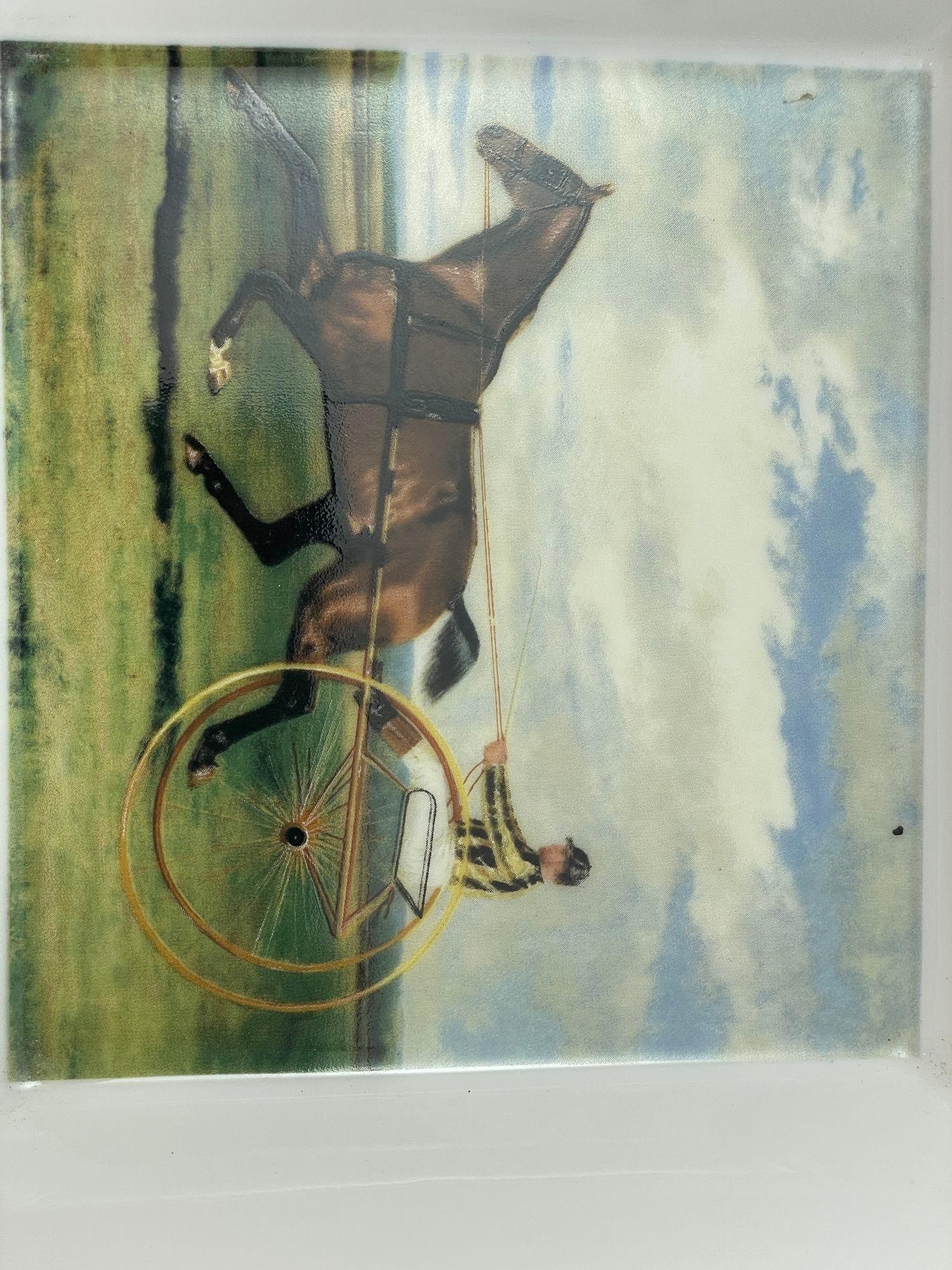 A. Raynaud Limoges decorative trinket dish with horse and sulky cart driver.
A French porcelain jewelry tray catchall or vide-poche dish with center equestrian design.
The Piece has a beautiful portrait of a horse with gold cart driver.
Colors