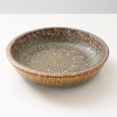 Assiette Rebus de Gunnar Nylund pour Rorstrand.