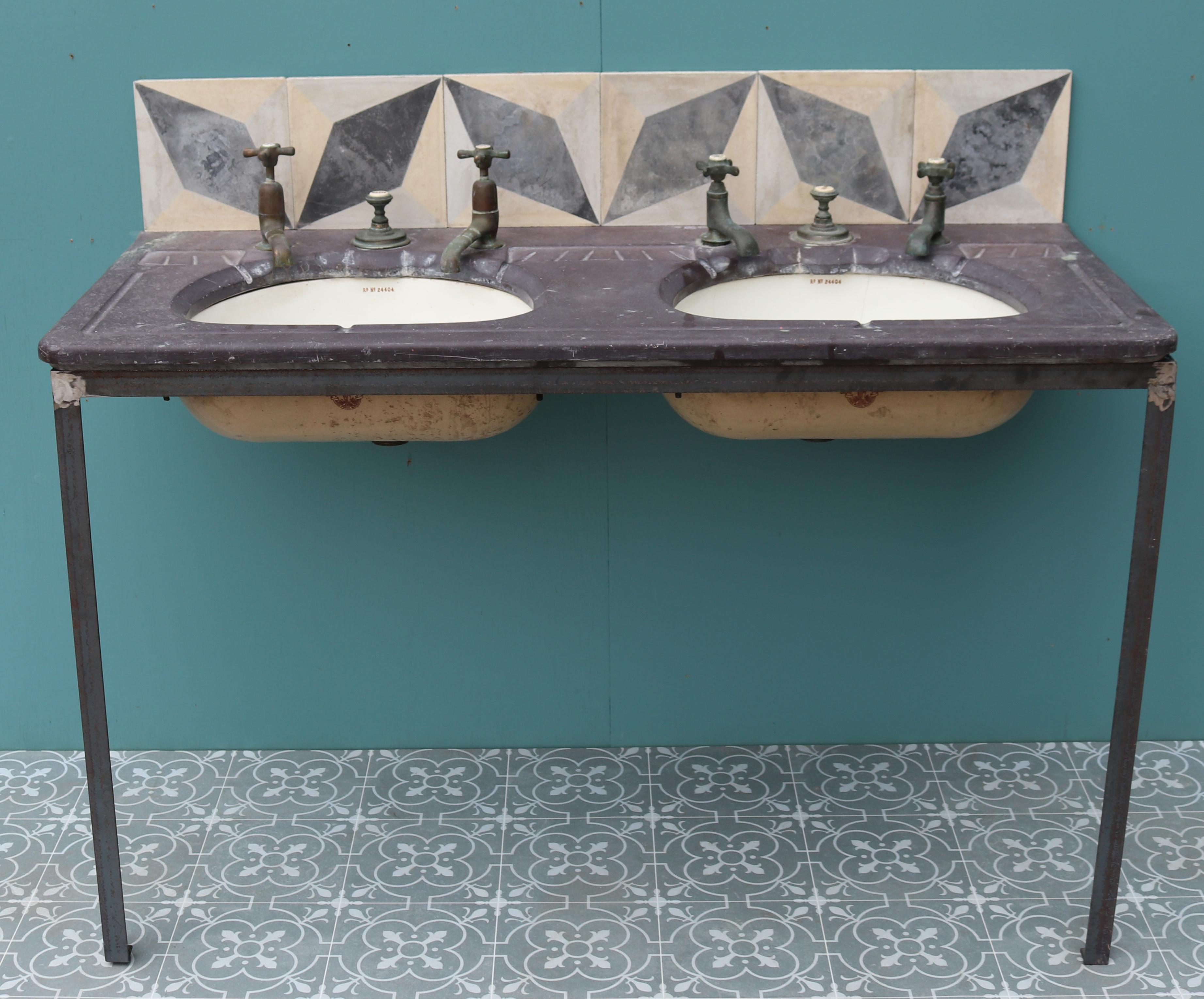 A reclaimed antique double basin or sink by Morrison Ingram & Co. Registered design number 24404. Constructed with a slate top, and under-mounted glazed stoneware basins. Supplied on a modern steel stand and tiles to form a splash-back.

We have