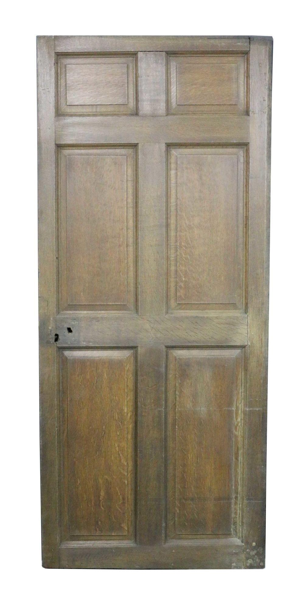 A reclaimed six panel front door constructed from oak.