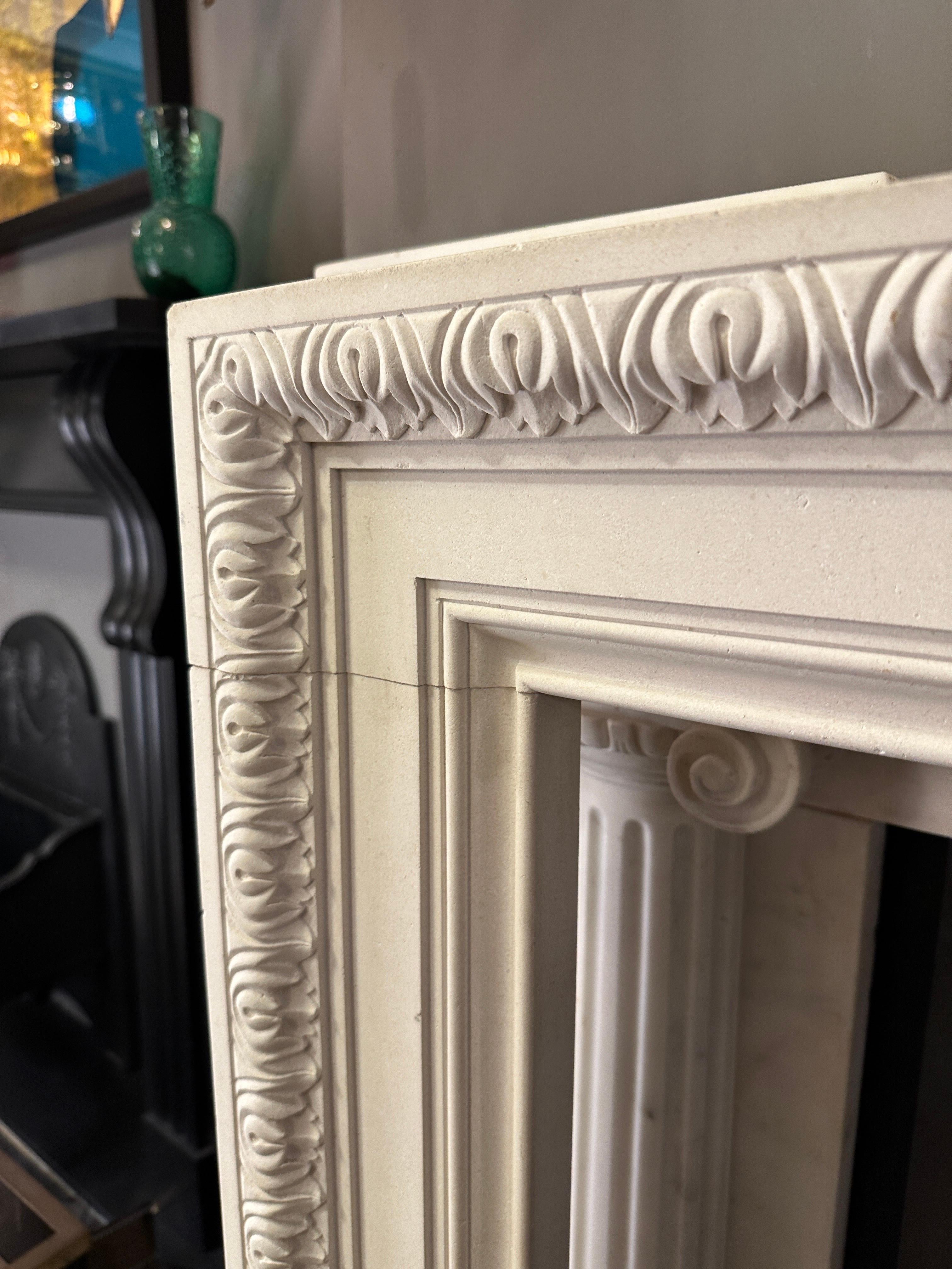 European A Reclaimed George II Style English Fireplace Mantel In Limestone For Sale