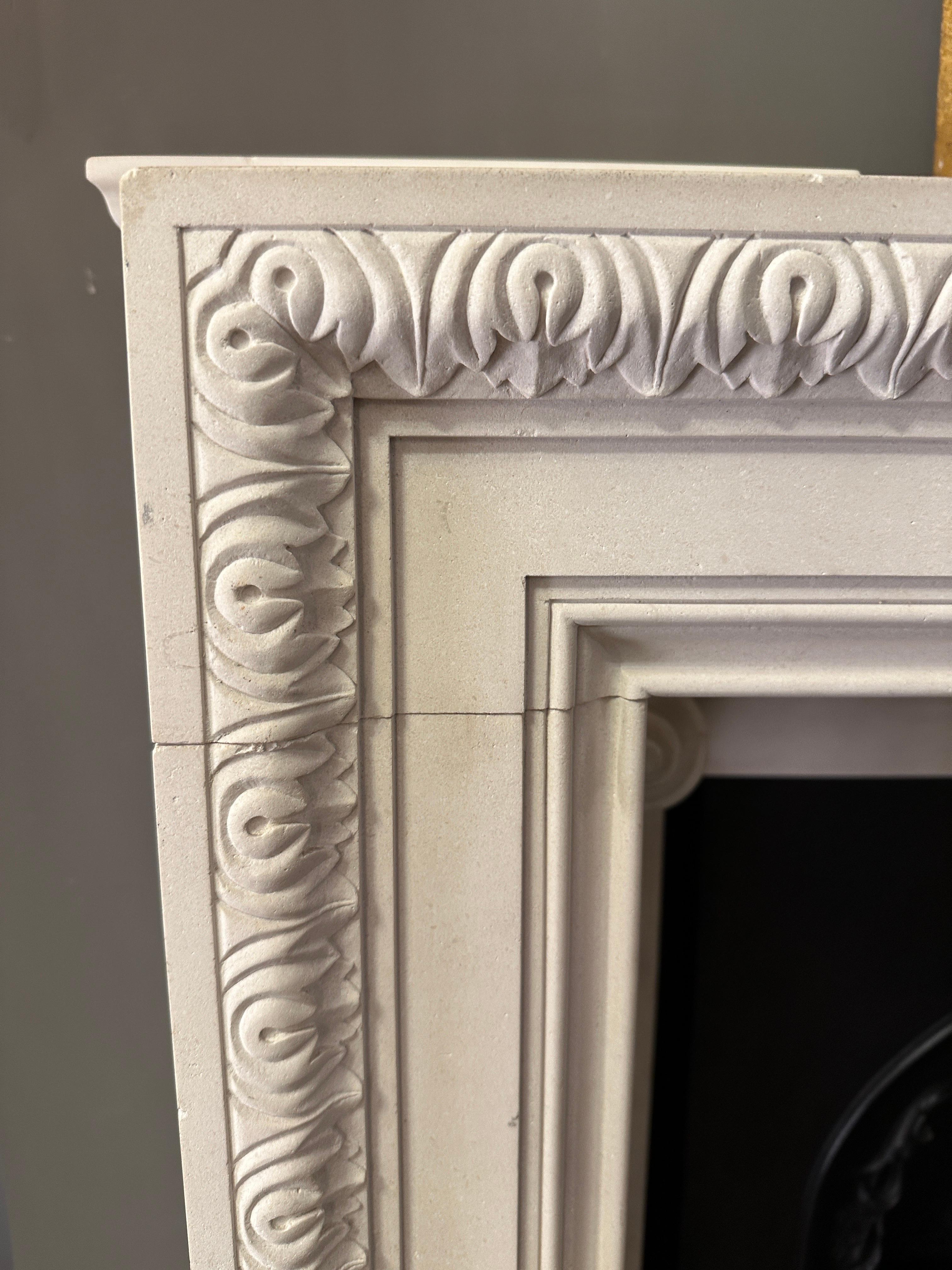 A Reclaimed George II Style English Fireplace Mantel In Limestone In Good Condition For Sale In London, GB