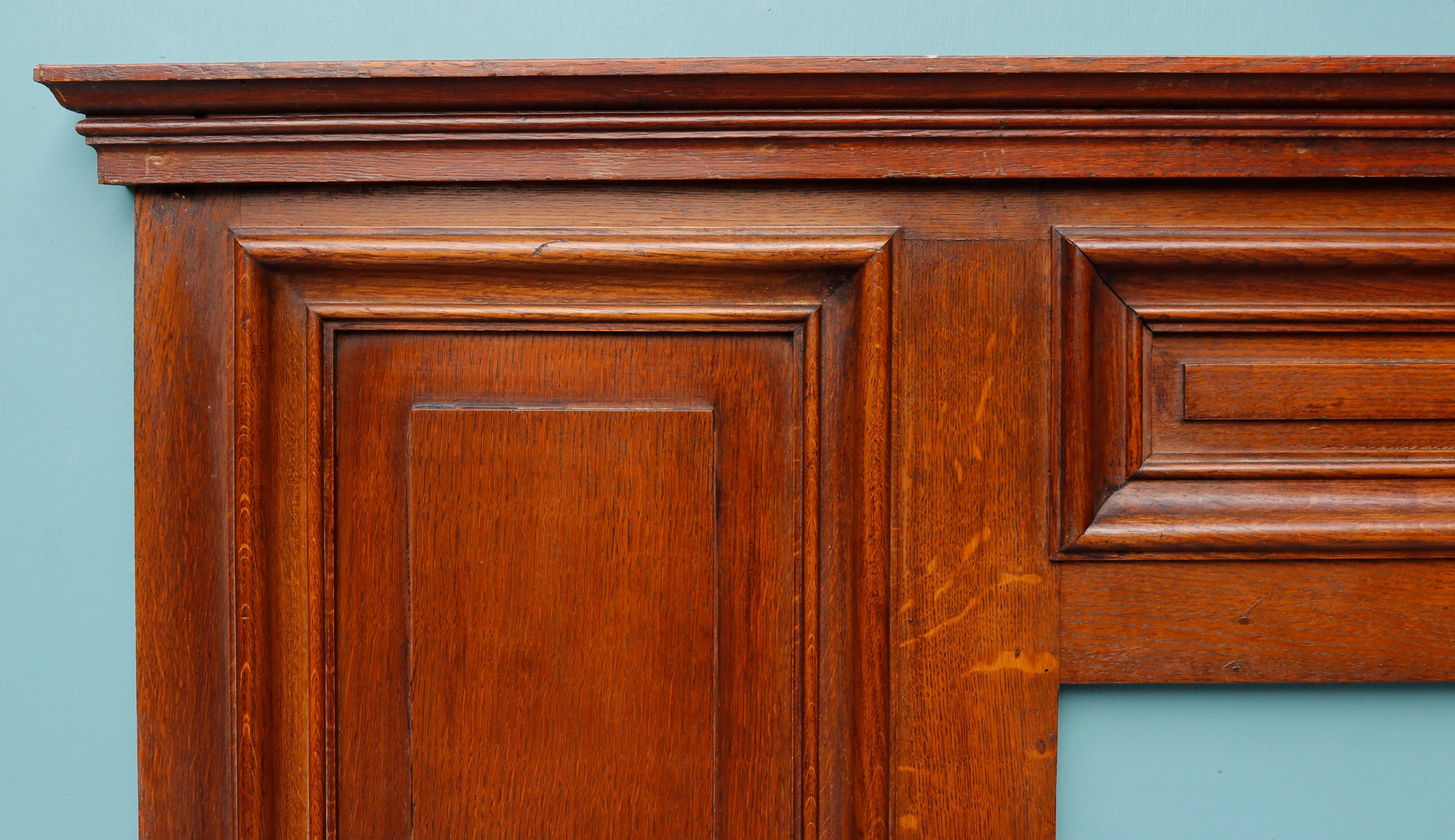 20th Century Reclaimed Panelled Oak Fire Surround For Sale