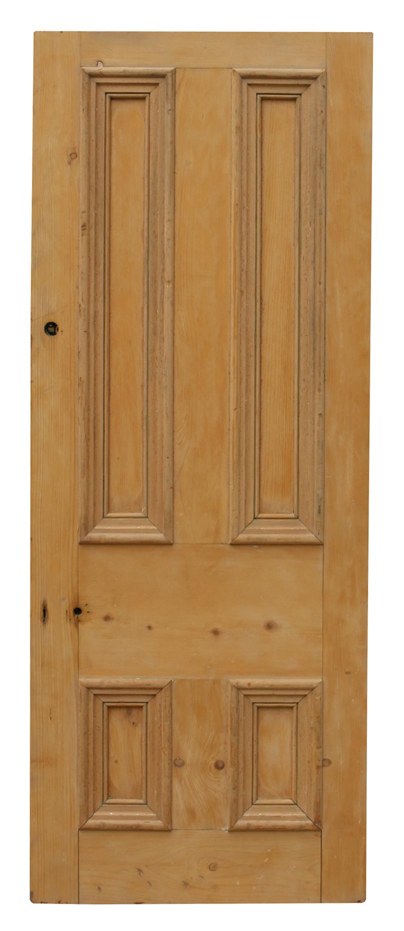 A reclaimed front door constructed from pine.