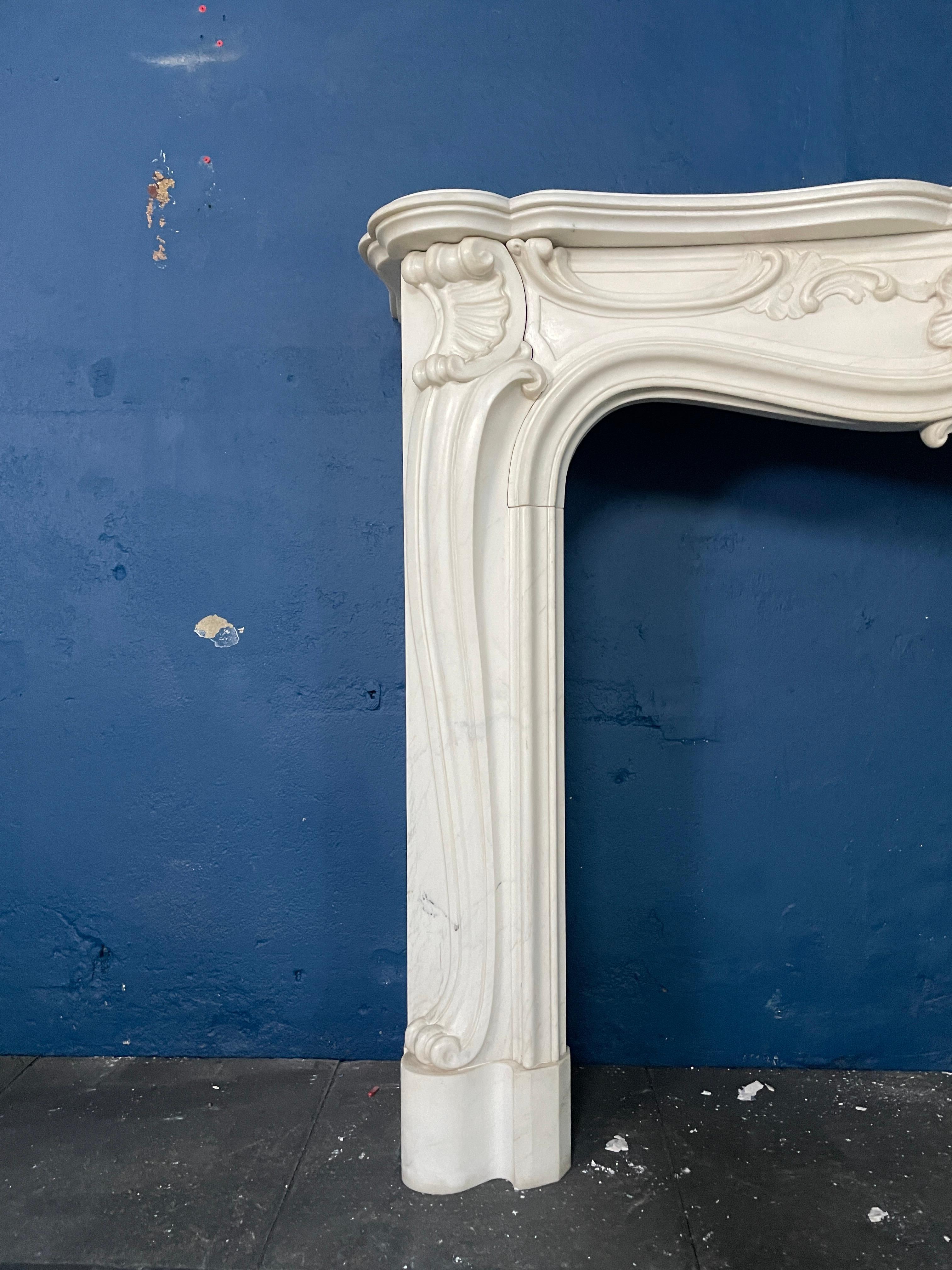 Carved A Reclaimed Rococo French Style Marble Fireplace Mantel  For Sale