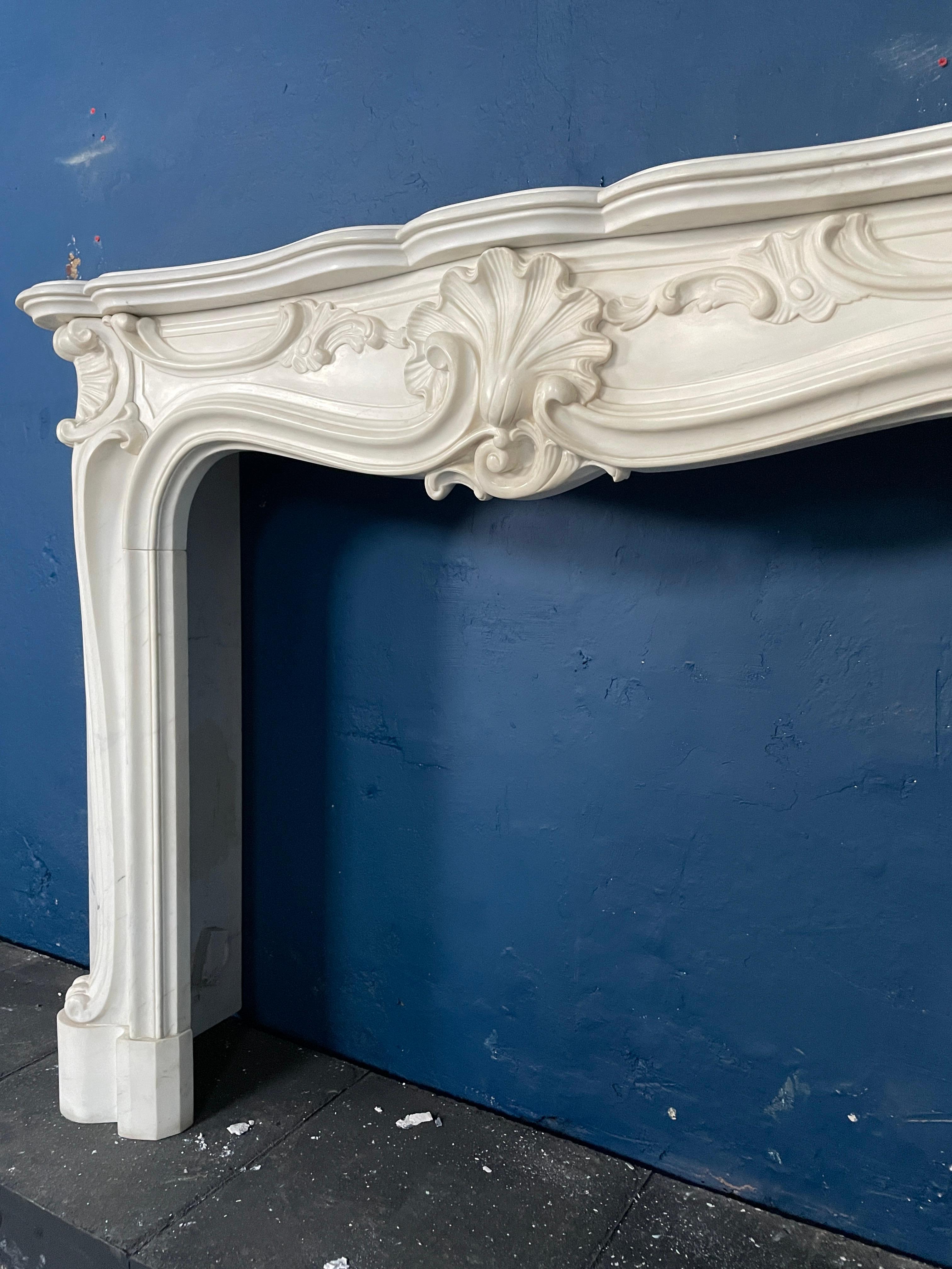18th Century and Earlier A Reclaimed Rococo French Style Marble Fireplace Mantel  For Sale