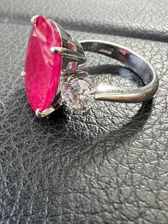 A Red Burmese Cushion Cut 15.93 Carat Ruby Set in a Platinum Gold Ring