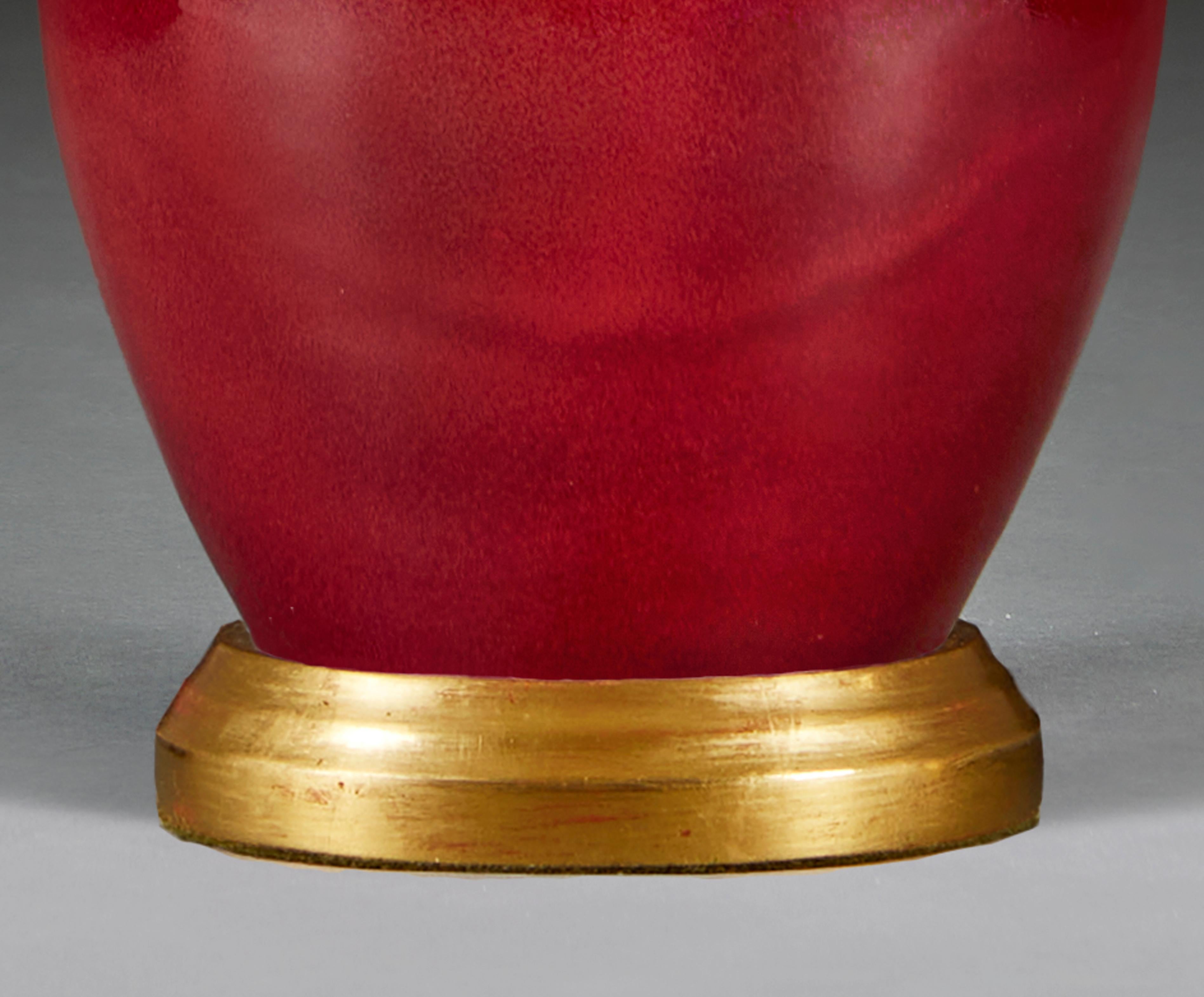 Glazed A Red Flambe Mei Ping Vase as a Table Lamp with Giltwood Base For Sale