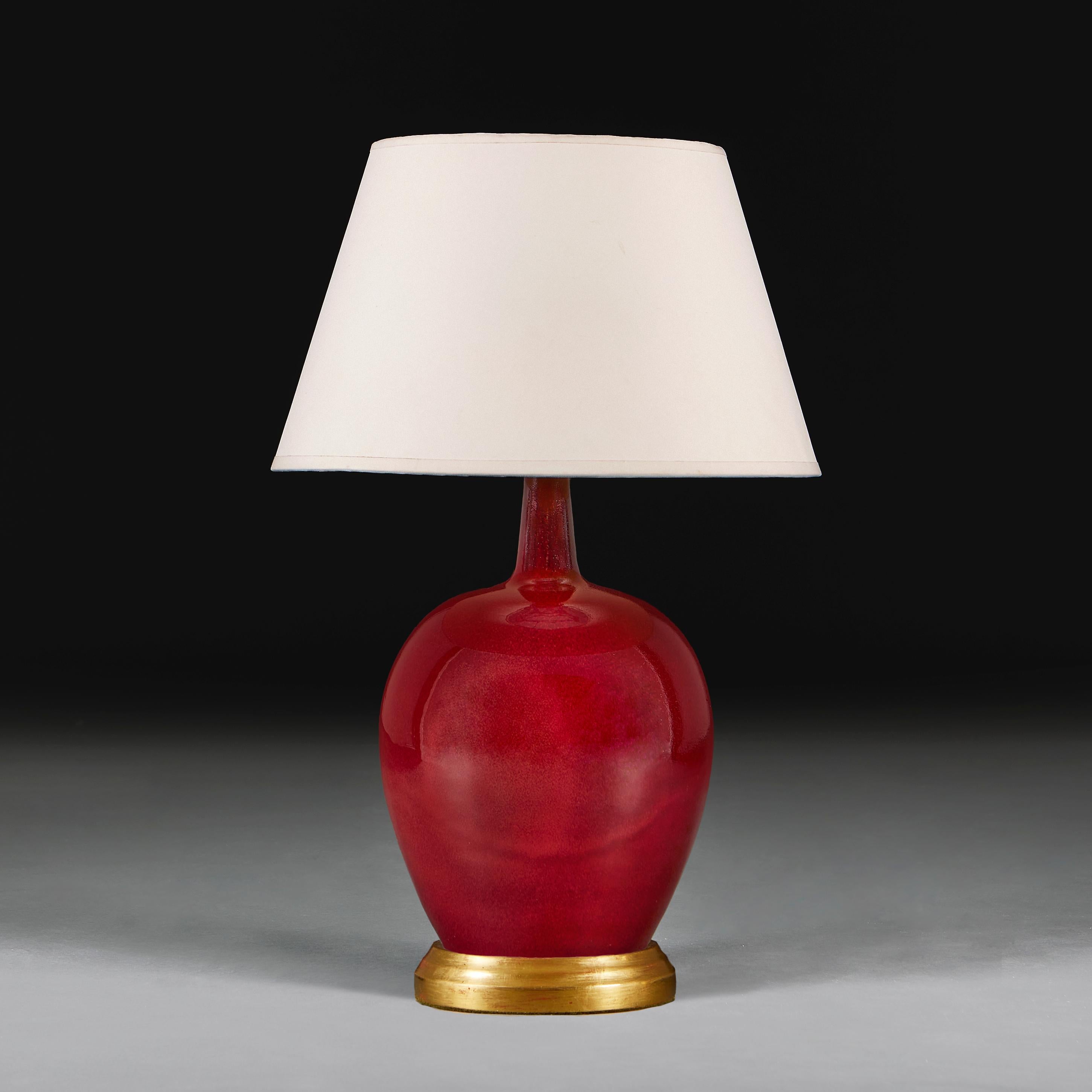 A Red Flambe Mei Ping Vase as a Table Lamp with Giltwood Base In Good Condition For Sale In London, GB