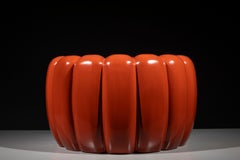 A red lacquer Japanese hibachi shaped like a chrysanthemum