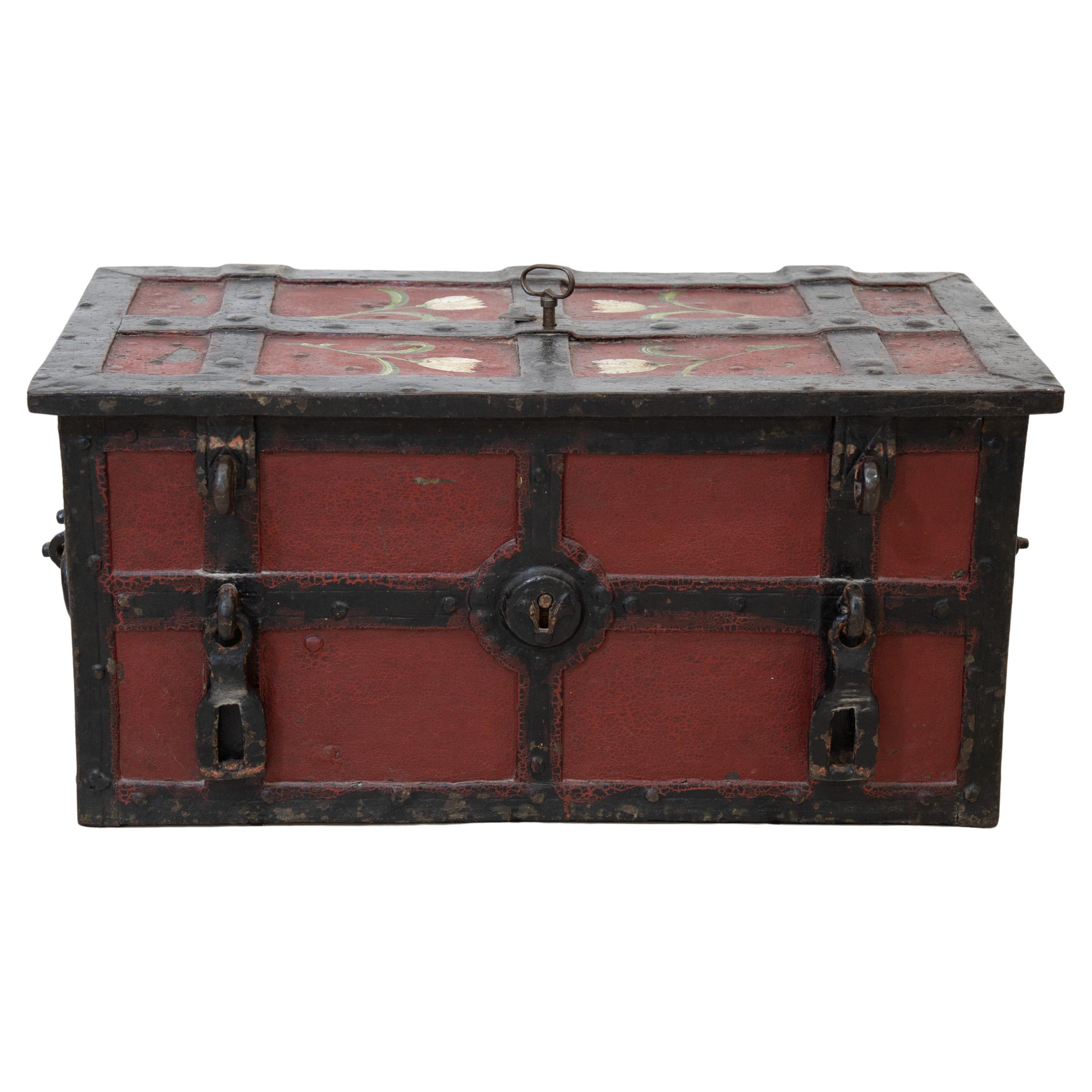 Un forziere in ferro battuto "Armada" laccato in rosso con serratura elaborata, XVII sec. in vendita