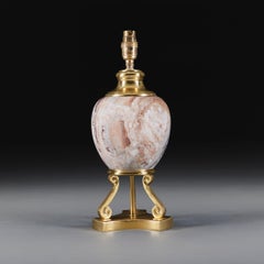 A Red Marble and Brass Table Lamp In the Manner of Maison Charles
